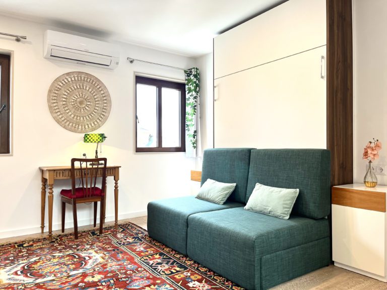 7-Quarto dia Sofa cortinas abertas